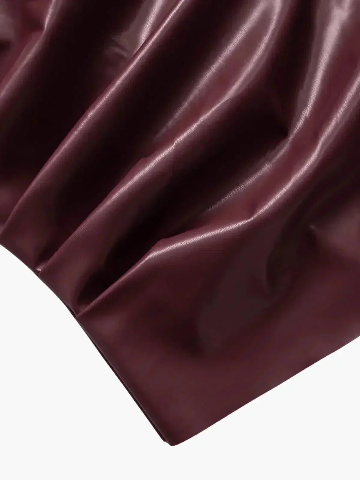 Arietta – Bas asymétrique Haut en simili cuir